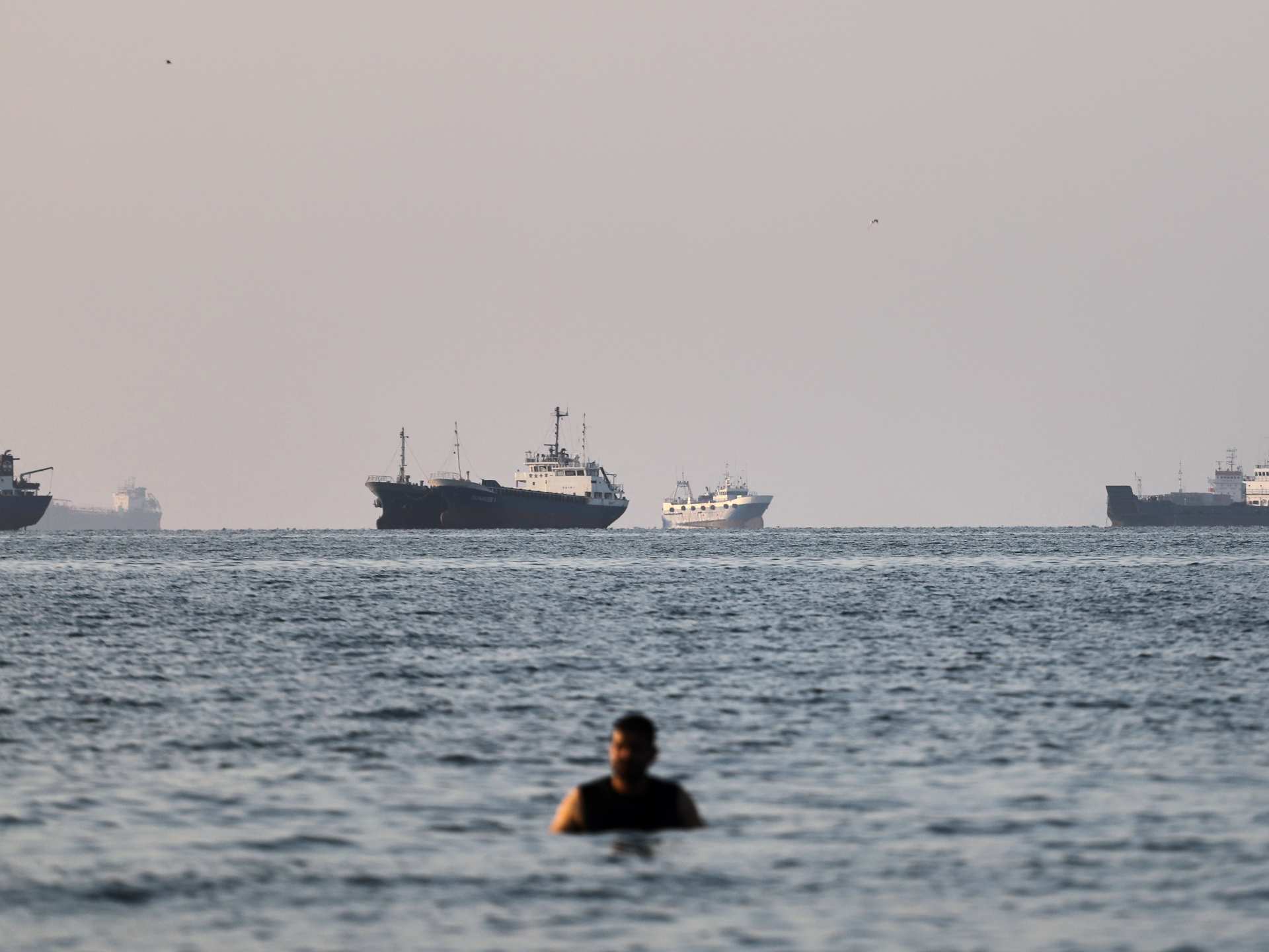Tanker on fire off coast of Oman after being hit by projectile