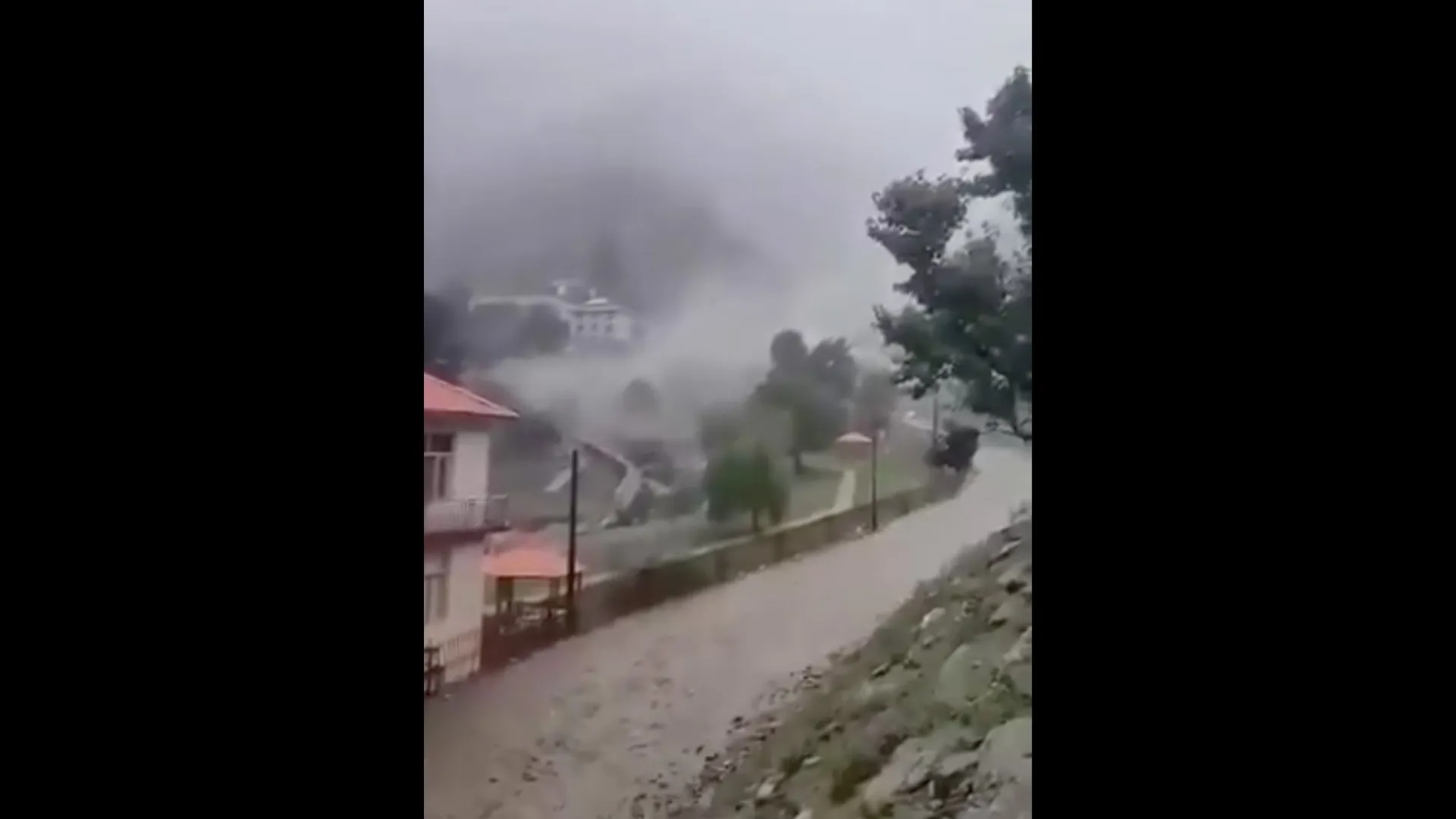 Moment terrifying floodwaters sweep through Afghan village